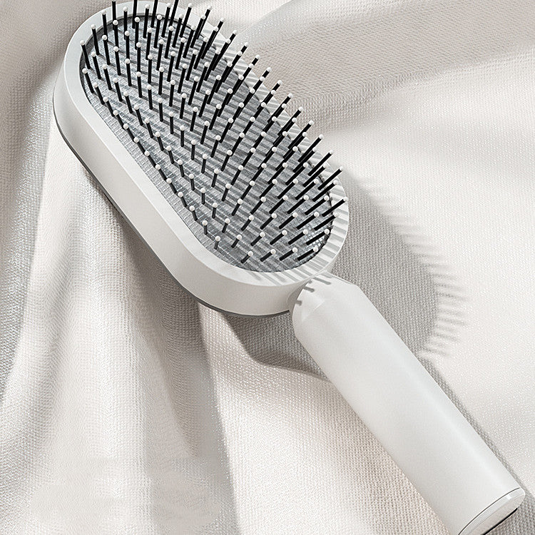 SCALPLUX™ Self-Clean Massage Brush