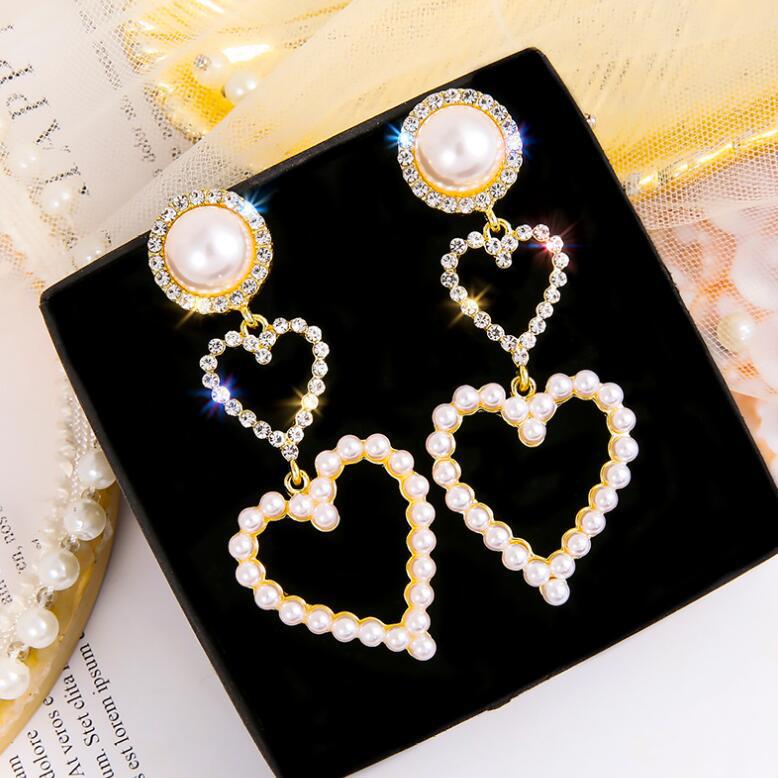 Double Heart Pearl Earrings – Luxury That Speaks Love