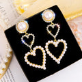 Double Heart Pearl Earrings – Luxury That Speaks Love