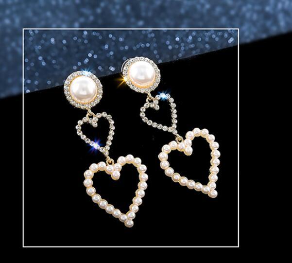 Double Heart Pearl Earrings – Luxury That Speaks Love