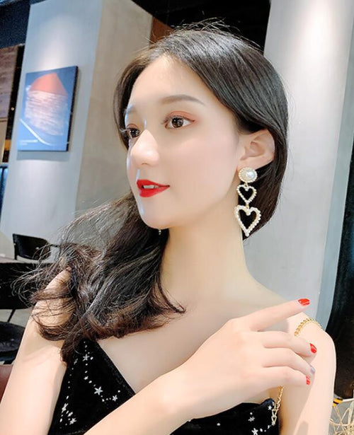 Double Heart Pearl Earrings – Luxury That Speaks Love