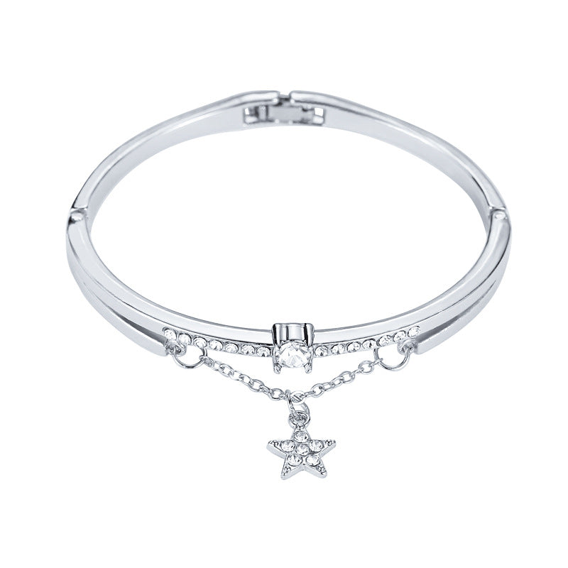 Celestial Star Charm Bracelet – Graceful Luxury with a Playful Sparkle