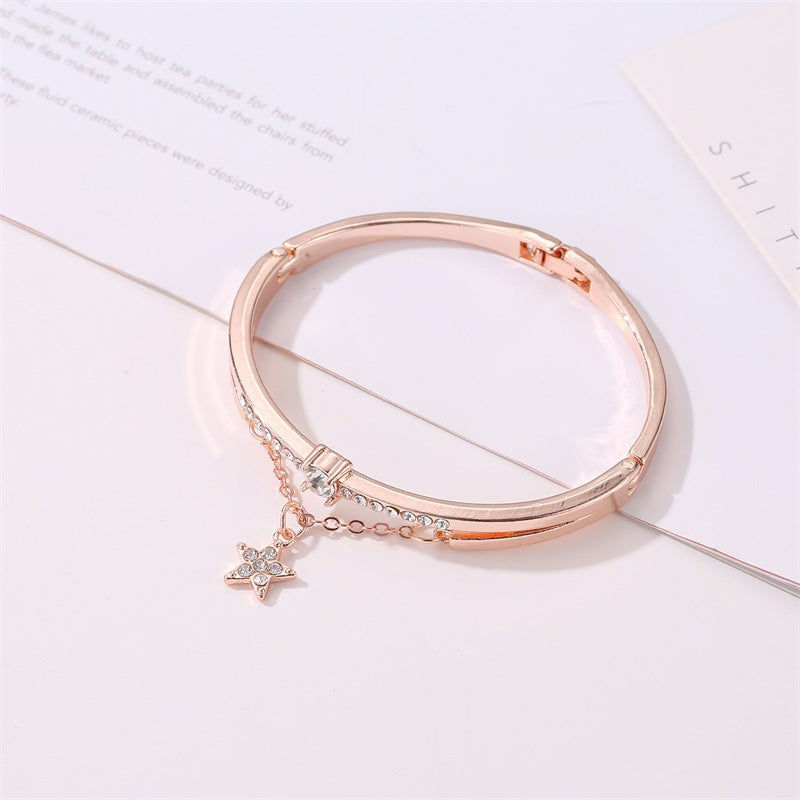Celestial Star Charm Bracelet – Graceful Luxury with a Playful Sparkle