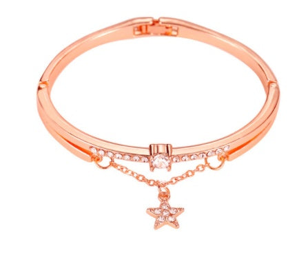 Celestial Star Charm Bracelet – Graceful Luxury with a Playful Sparkle