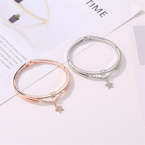 Celestial Star Charm Bracelet – Graceful Luxury with a Playful Sparkle