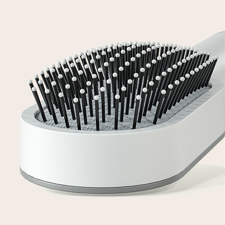 SCALPLUX™ Self-Clean Massage Brush